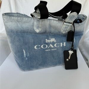 Coach Denim Distressed Blue Lg Tote with Black decorative Accents NWT